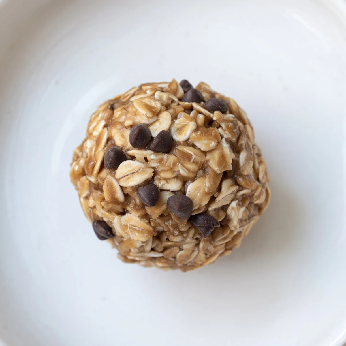 A close-up of perfectly formed No-Bake Peanut Butter Energy Balls ready to enjoy as a snack.