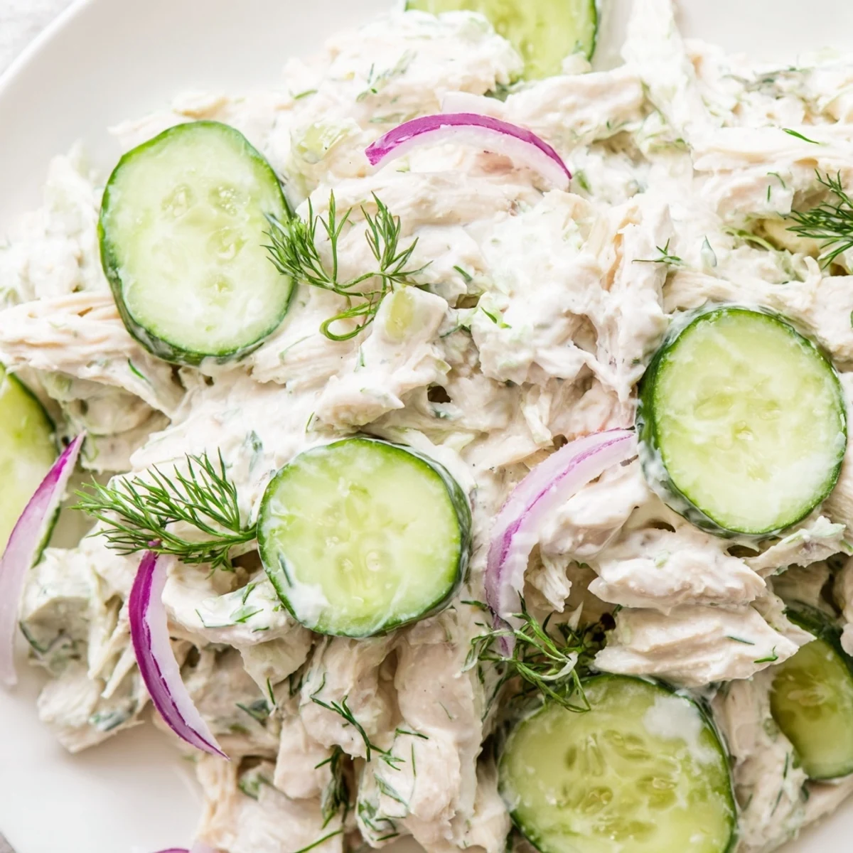 Freshly made Creamy Cucumber Chicken Salad with tender chicken and crisp cucumbers in a creamy dill yogurt dressing.
