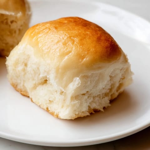 Fluffy and soft, these Quick-Rise Dinner Rolls are a perfect accompaniment to any comfort food feast.
