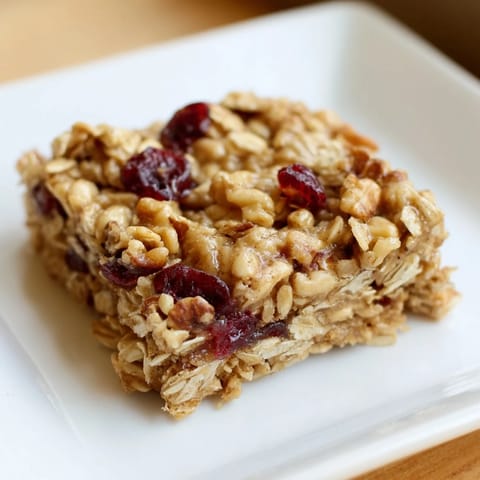 A close-up of soft Maple Cinnamon Oatmeal Bars, perfect for a quick breakfast or snack.