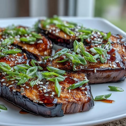 Miso Glazed Eggplant, glistening with sweet caramelization, a perfect vegetarian side.