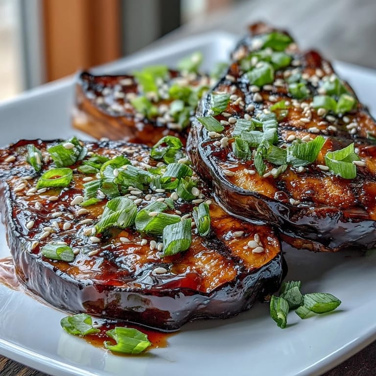 Umami-rich Miso Glazed Eggplant, broiled to perfect caramelization, a delightful main.